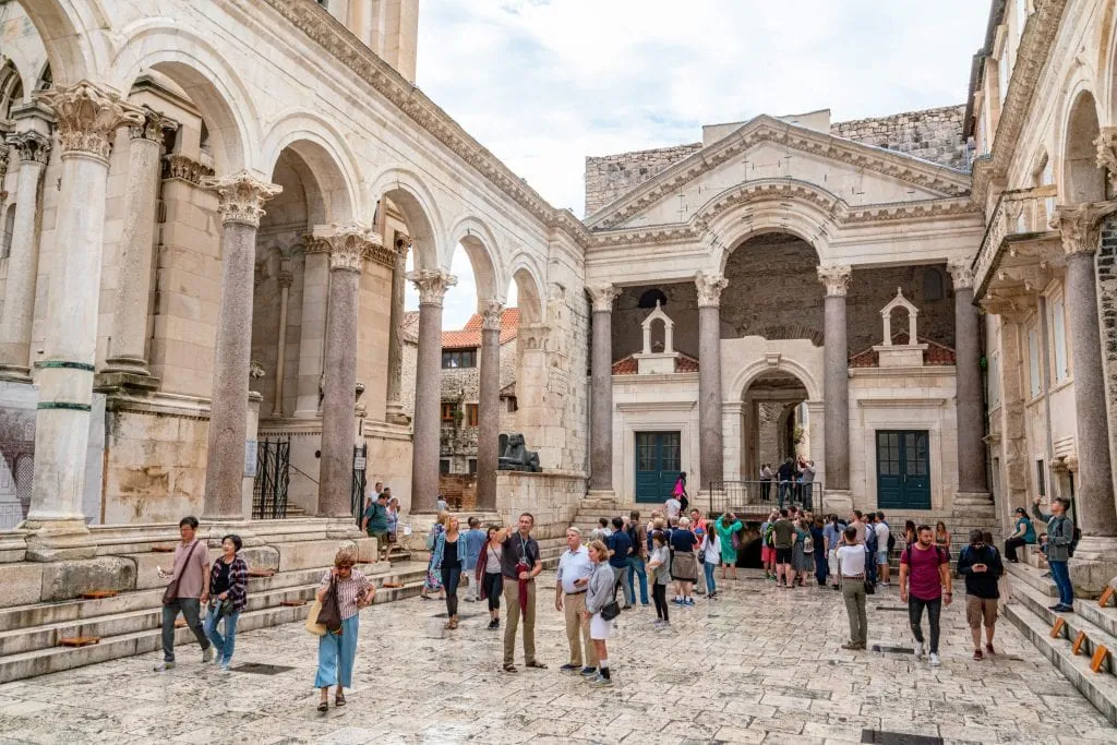Interior courtyard of Diocletian's Palace in Split Croatia with tourists in the center