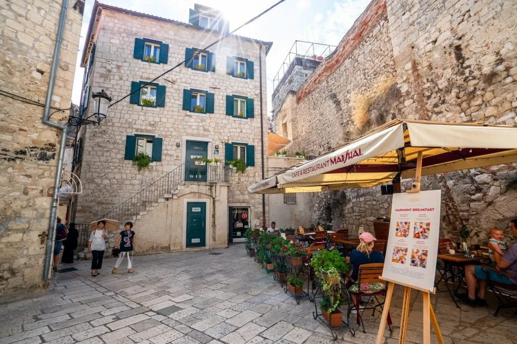 Small square in Split Croatia with a sunflare--quiet spots like this are one of the best things about seeing Split in one day!