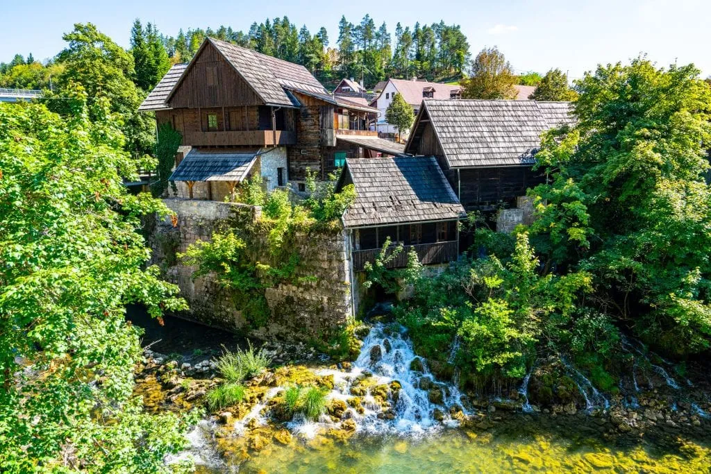 Mill in Rastoke Croatia with a waterfall underneath it, an unforgettable sight on this Croatia in 10 days Croatia itinerary