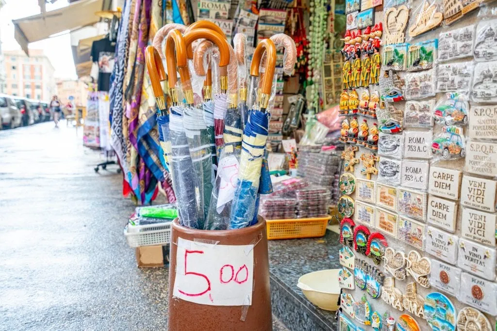 umbrellas for sale on a rainy day in rome italy