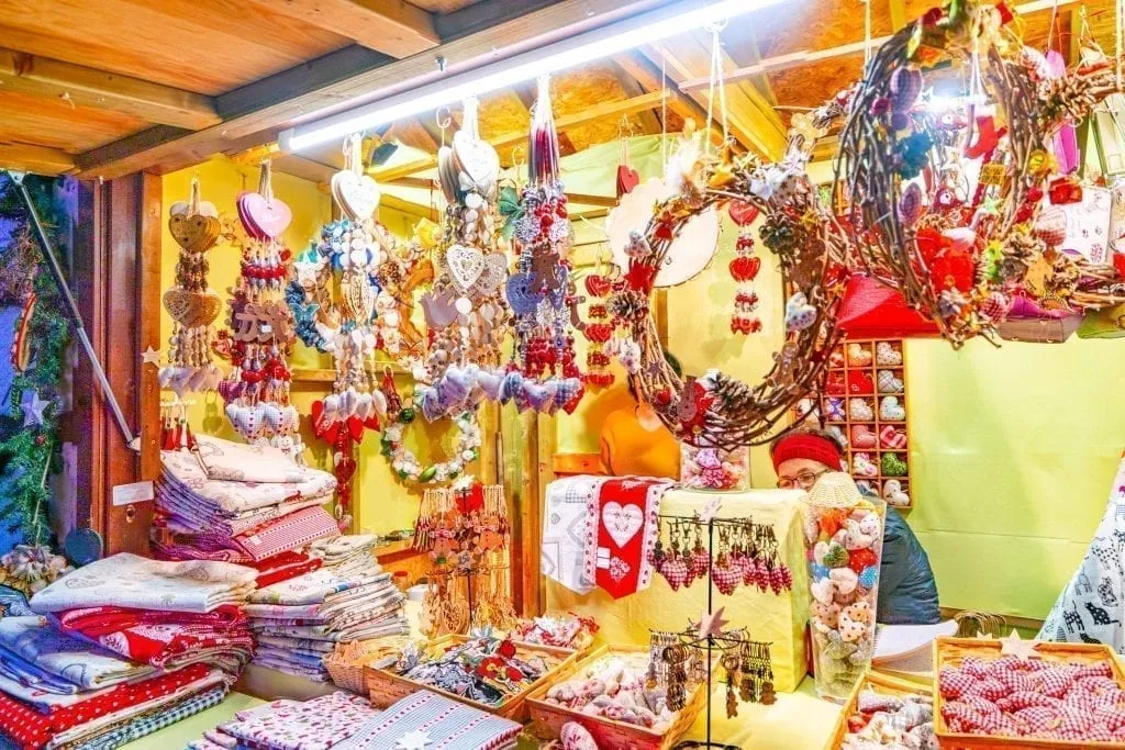 linens and handicrafts for sale, as seen when shopping at christmas market alsace
