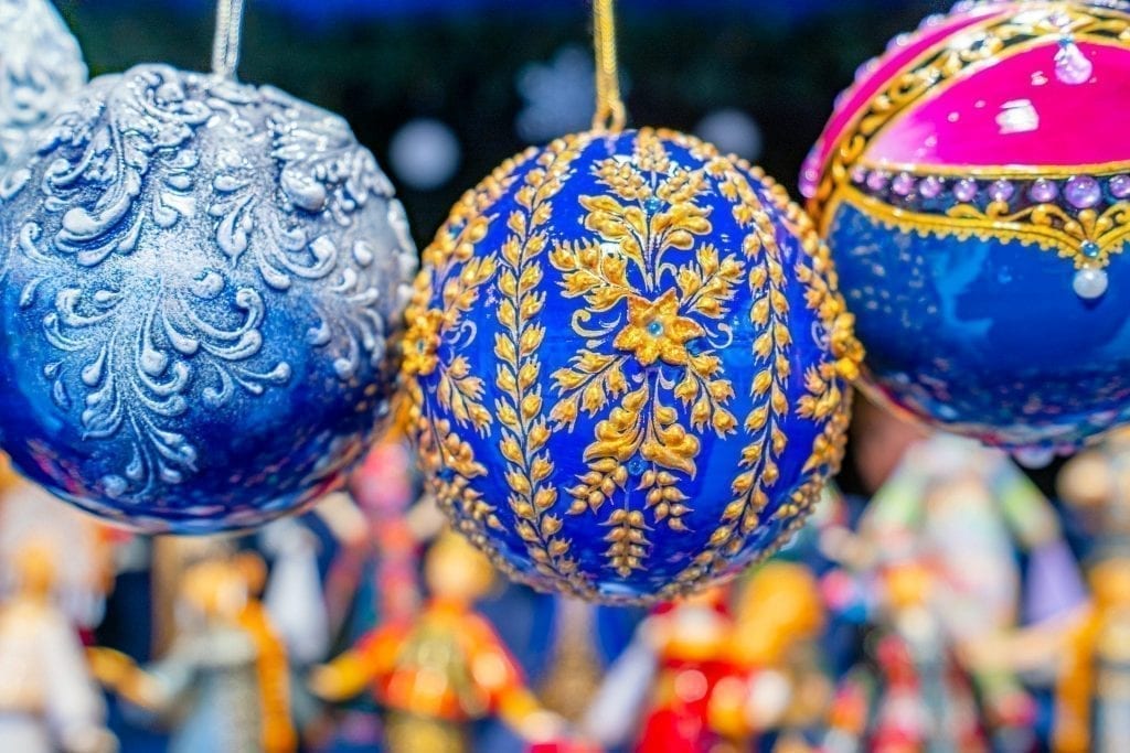 Beautiful blue and gold ornament for sale in at a Colmar Christmas market in winter