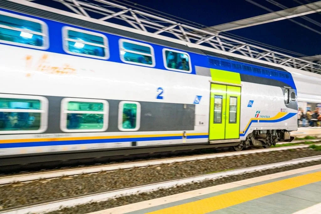 train pulling in to the station in rome, a common sight during a 4 days in rome itinerary