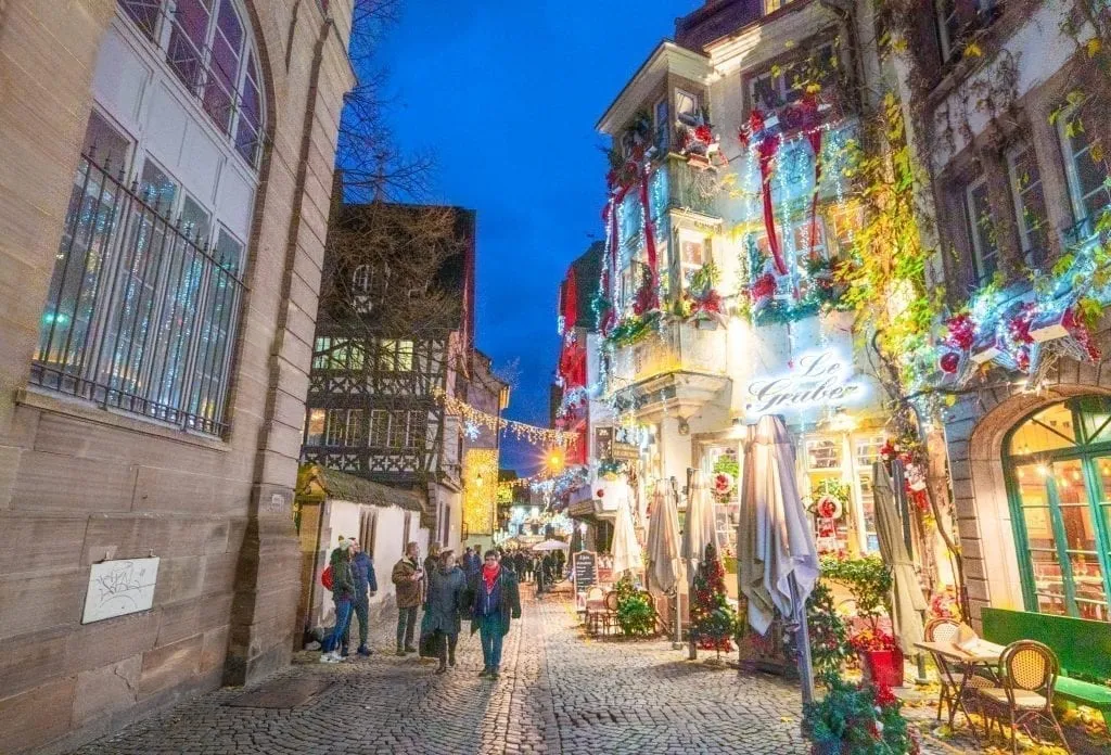 Street in Strasbourg France decorated for Christmas at blue hour