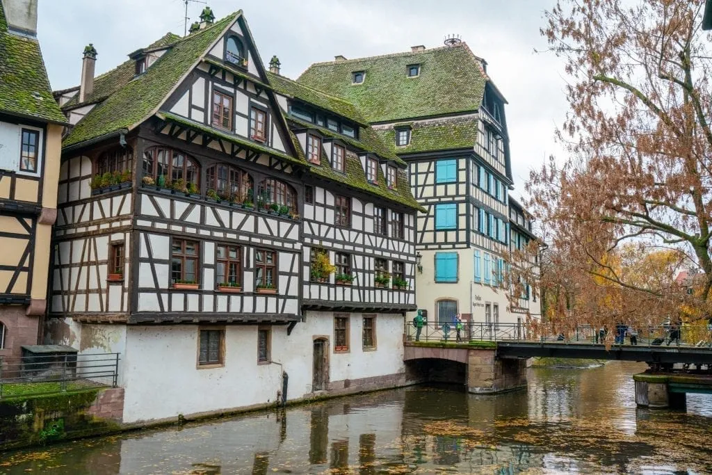 La Petite France neighborhood in Strasbourg France with a canal in the foreground