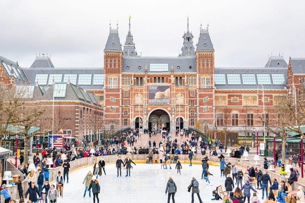 Ice skating rink in Amsterdam with Rijkmuseum visible behind it