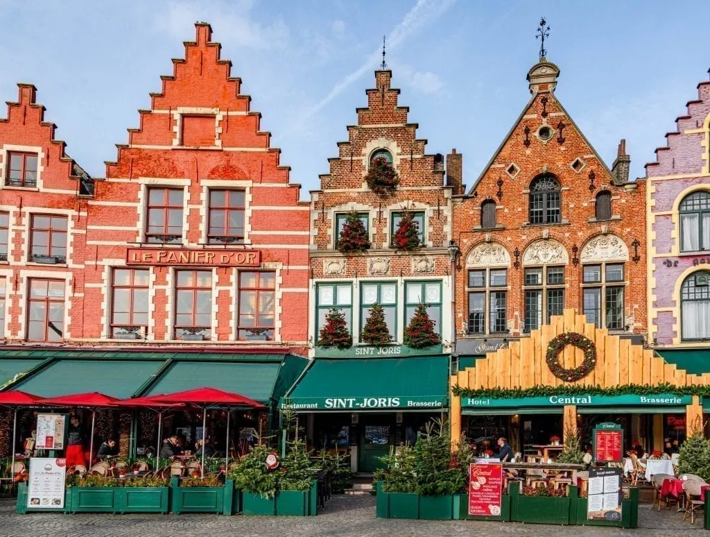 grote markt in bruges belgium, a fun stop for your first time traveling europe