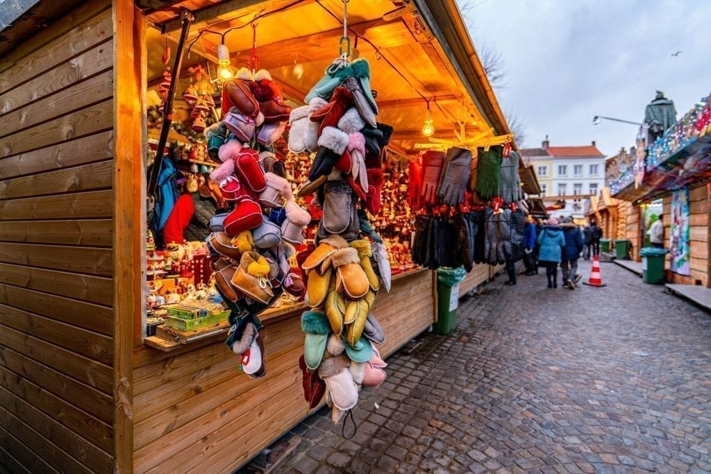 bruges christmas market stall selling mittens