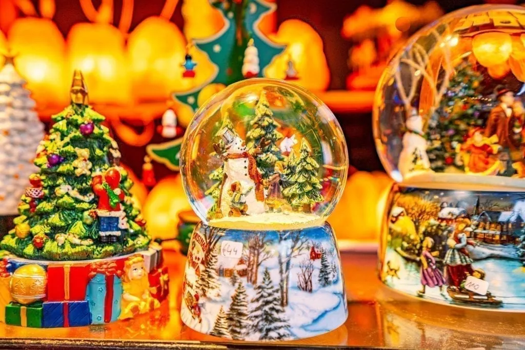 snow globes for sale at one of the christmas markets in belgium december