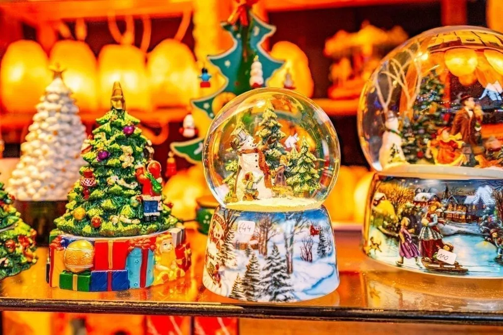 snow globes for sale at one of the christmas markets in bruges belgium