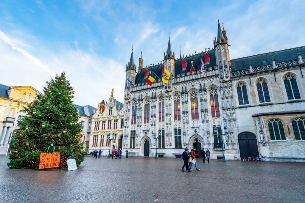 bruges city hall facade with bruges christmas tree in front during bruges winter