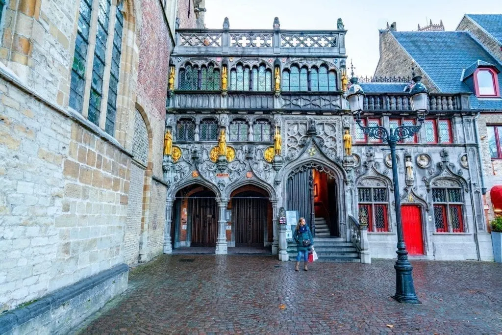 Front facade of the Basilica of Holy Blood in Bruges Belgium, an essential stop on a one day in Bruges itinerary