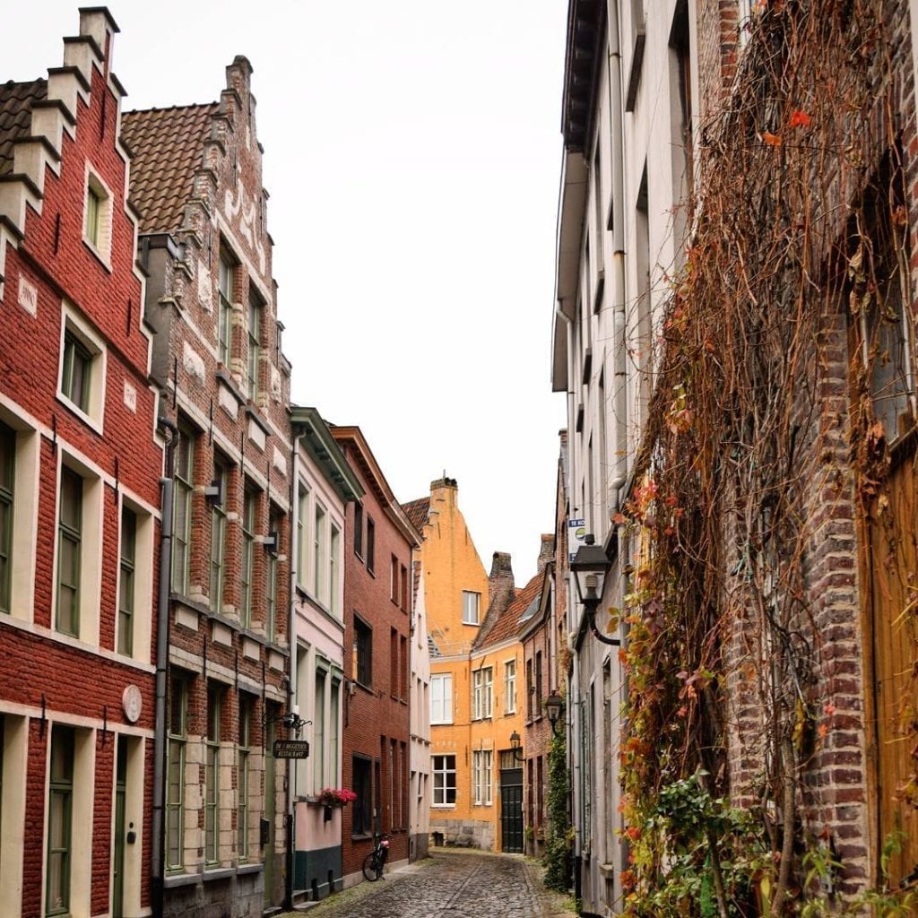 Street in Patershol Ghent with houses on either side and no people or traffic--be sure to walk down plenty of streets like this during your 3 days in Belgium