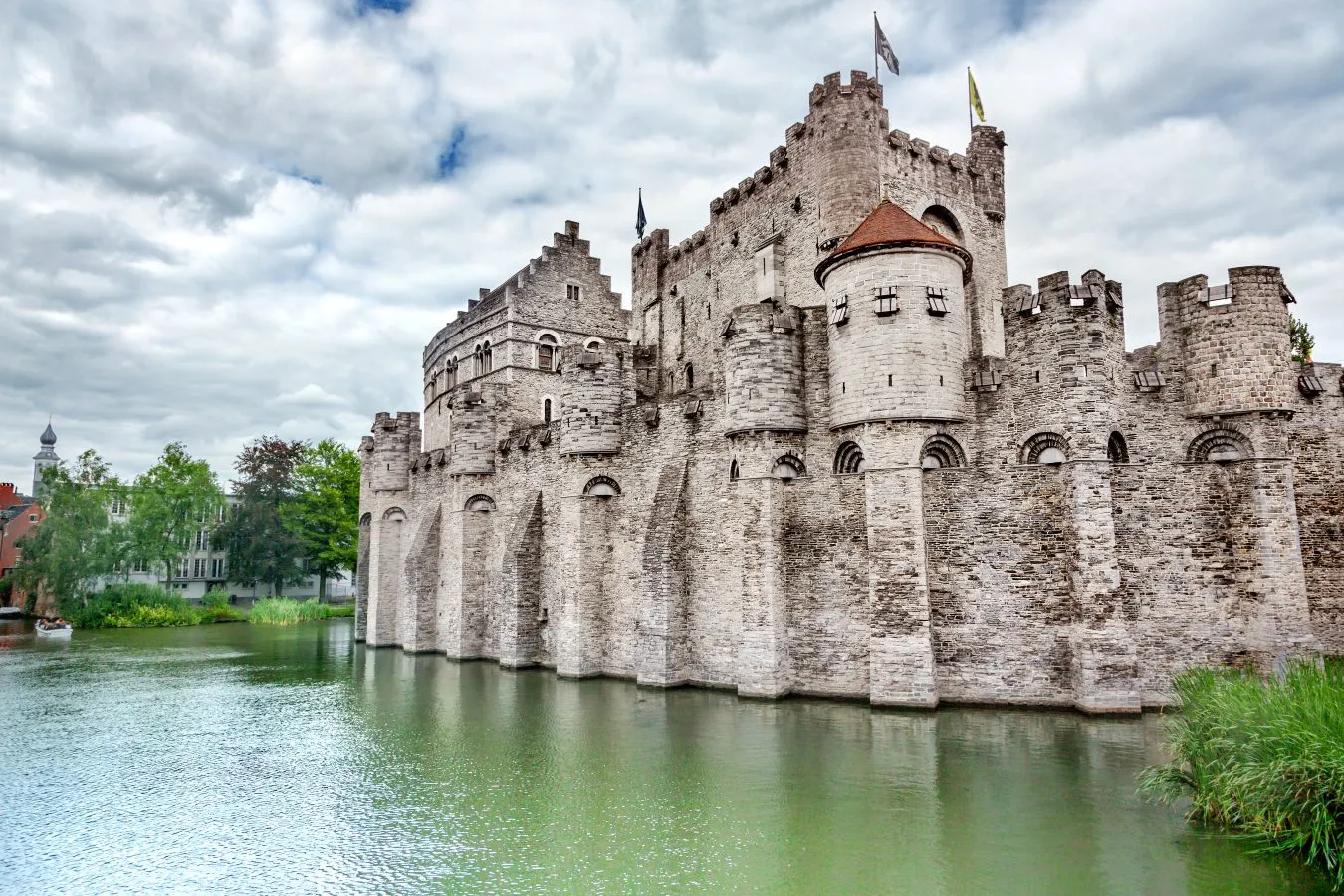 exterior of gravensteen castle in ghent belgium on a cloudy day