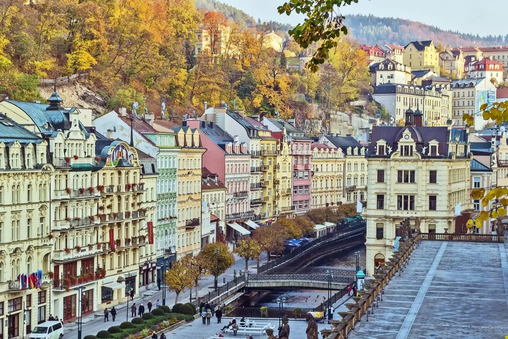 colorful houses in historic Karlovy Vary in the fall, a czech town that is a great option for driving tours in europe