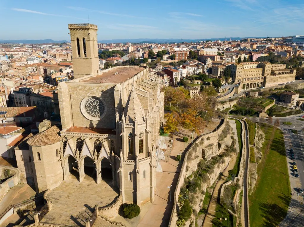 view of cathedral of manresa spain from above, a fun stop when planning a european road trip from spain to andorra