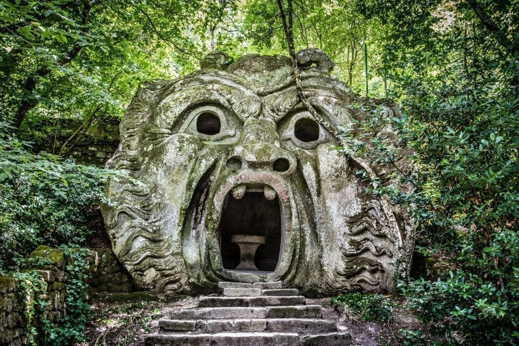 Monster entranceway in Bomarzo Park of Monsters in Lazio. Bomarzo is one of the most unique day trips from Rome Italy