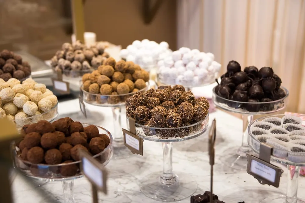 Selection of Belgian chocolates in clear bowls--don't miss the chance to eat lots of chocolate during your 3 day Belgium trip!