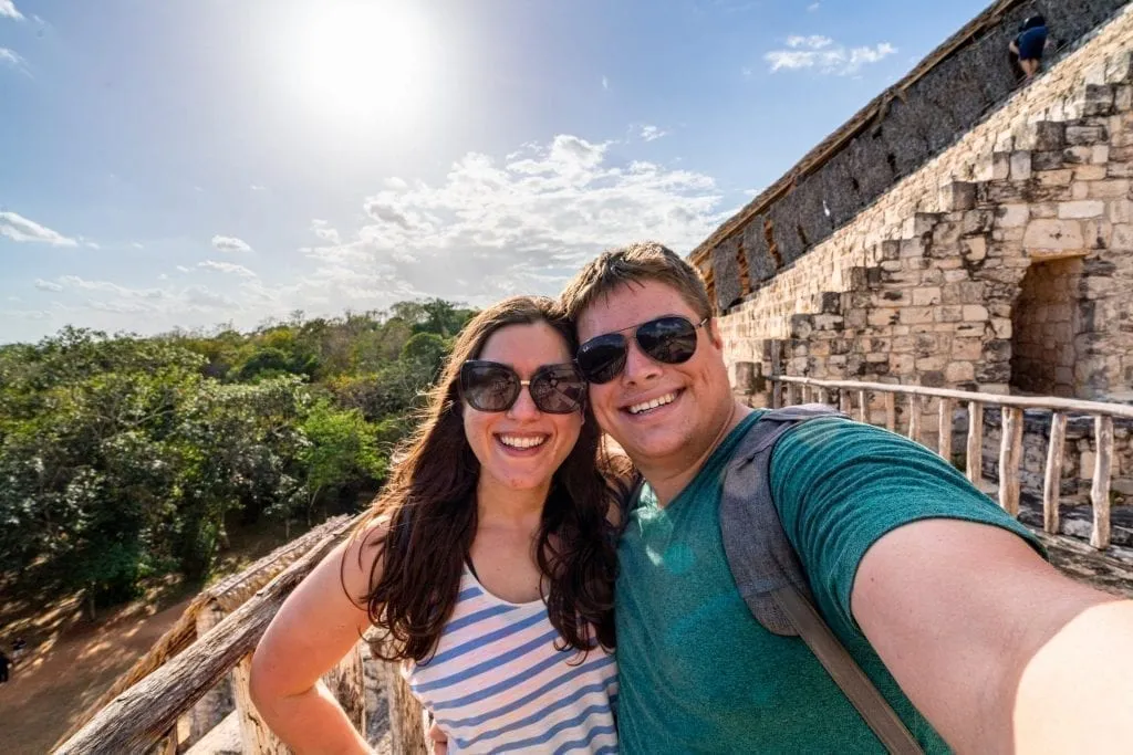 Kate Storm and Jeremy Storm taking a selfie on Ek Balam's main pyramid