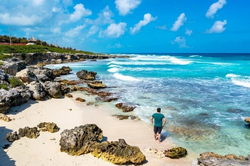 Jeremy Storm on the rocky beach of Isla Mujeres east coast