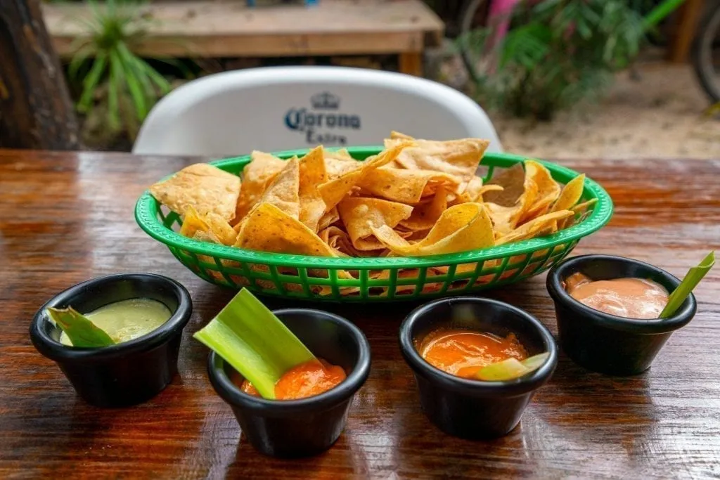 Tortilla chips and a selection of salsas as seen when traveling in Mexico travel tips