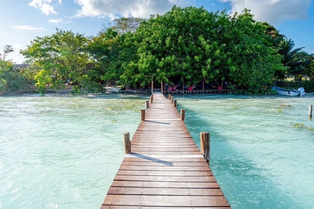 Dock in Bacalar Mexico as seen leading back to La Playita restaurant on a road trip Yucatan itinerary