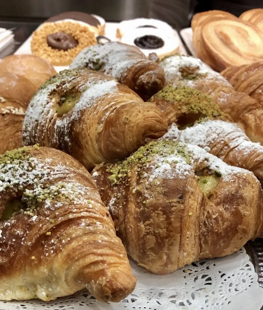 Pile of Italian breakfast pastries as seen when ordering coffee in Italy