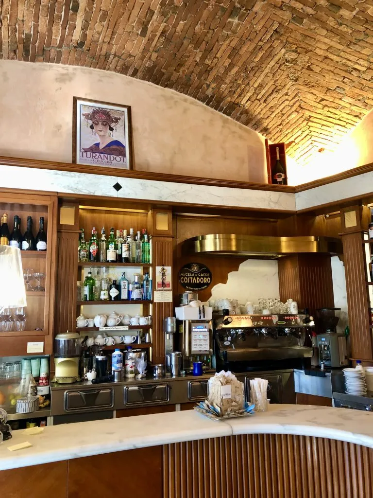italian coffee bar with brick ceiling in lucca italy