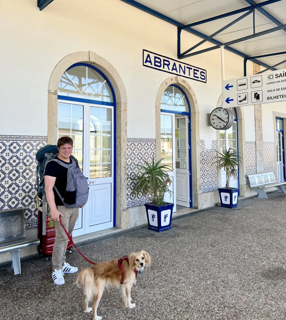 jeremy and ranger at abrantes portugal train station when traveling europe by train