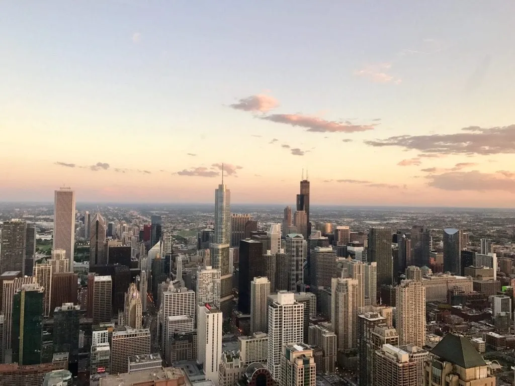 Chicago Skyline at sunset--views like this are plentiful throughout this 3 day Chicago itinerary!