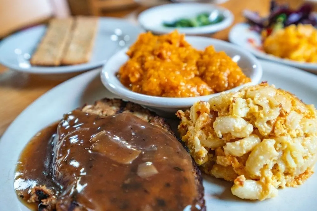 Close up of meatloaf, mac n cheese and sweet potatoes, classic lowcountry foods