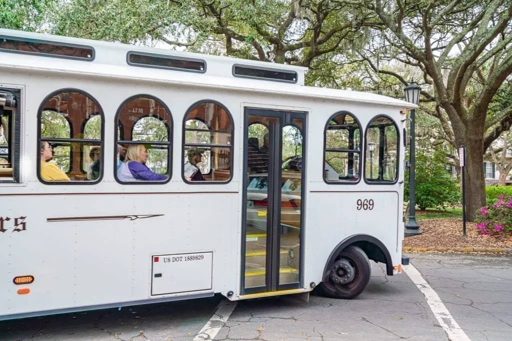 White trolley driving through Savannah GA