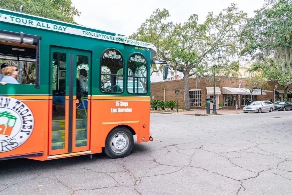 Savannah's Hop On/Hop Off Trolley Tour rounding a corner--you'll see plenty of these guys around during your 3 days in Savannah itinerary!