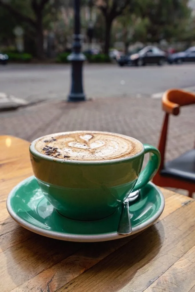 spiced lavender mocha latte on outdoor table at collins quarter, a great stop during a day trip to savannah georgia