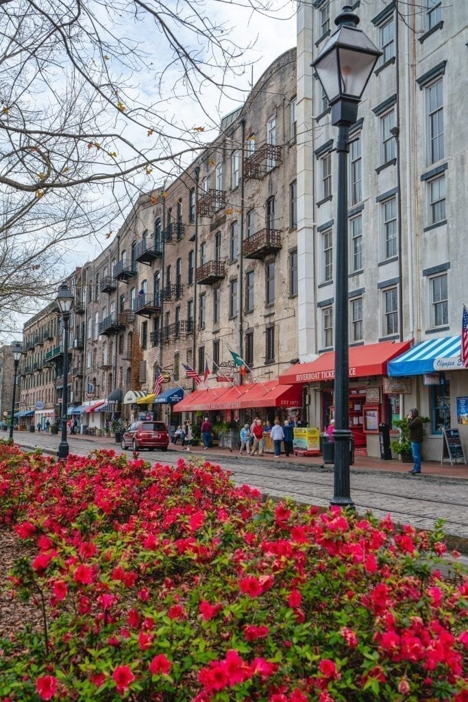 front facades of buildings on river street, one of the top streets in savannah ga