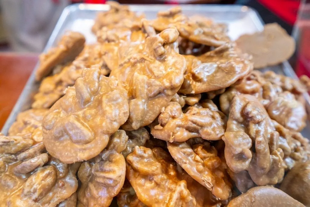 Plate of pralines piled up in River Street Sweets, one of the best places to eat in Savannah Georgia