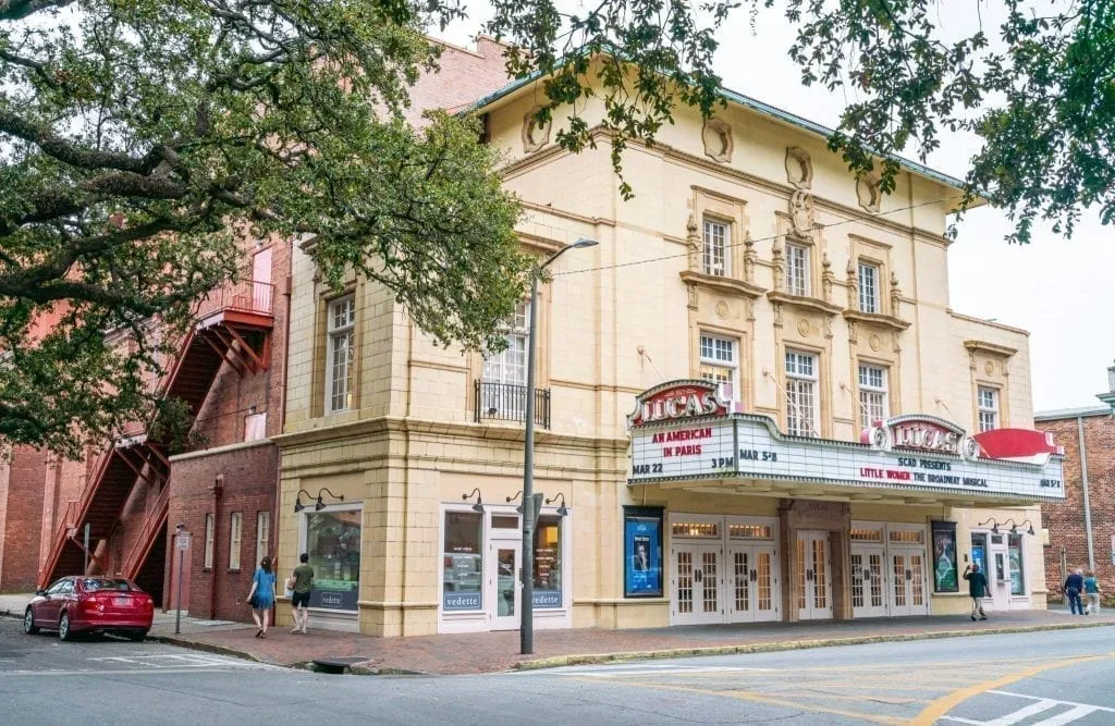 Lucas Theater in Savannah GA with trees from oak trees in the forgeround