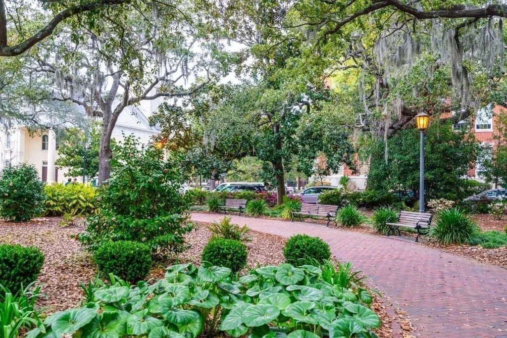 Shaded red path in Chippewa Square, an essential stop on a Savannah weekend getaway