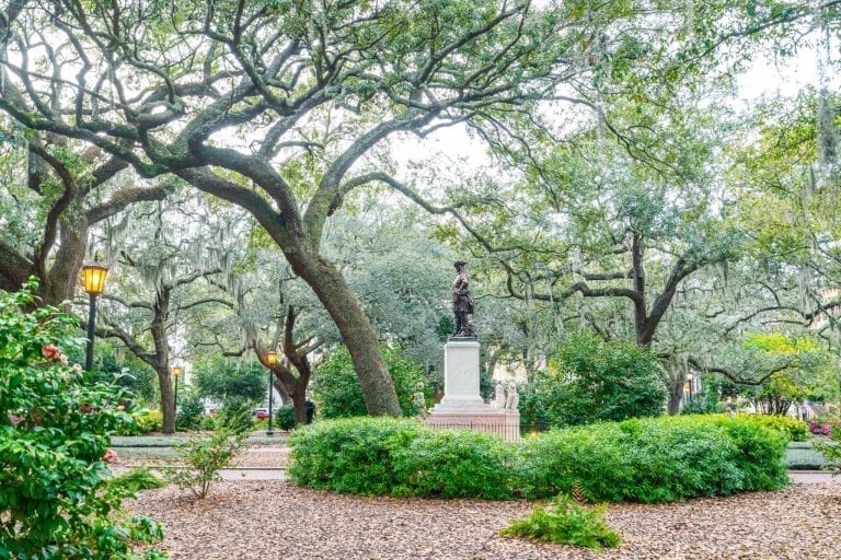 City square in Savannah GA with a statue in the center--these city squares should be considered when choosing Savannah or Charleston