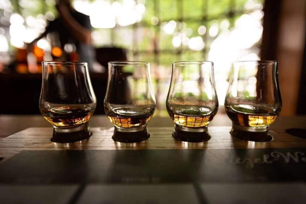 Flight of Bourbon--you'll see plenty of these if you take one of the best us road trips in the south, the kentucky bourbon trail