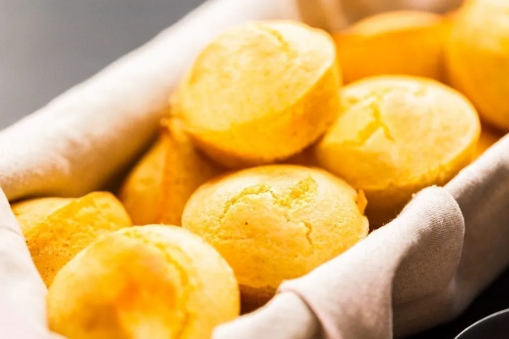 Basket of cornbread muffins one of the best Savannah foods to eat