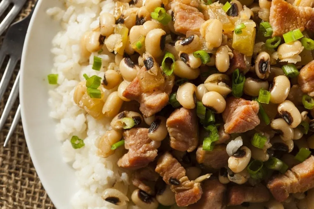 Plate of hoppin' john shot from above and on a white plate--when exploring food in Savannah GA considering trying this classic dish