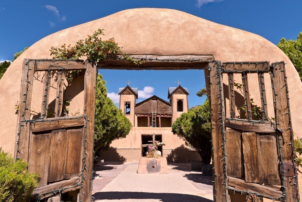 Chimayo Pueblo Church in northern New Mexico, a popular pilgrimage site and a stop on one of the best road trips in America