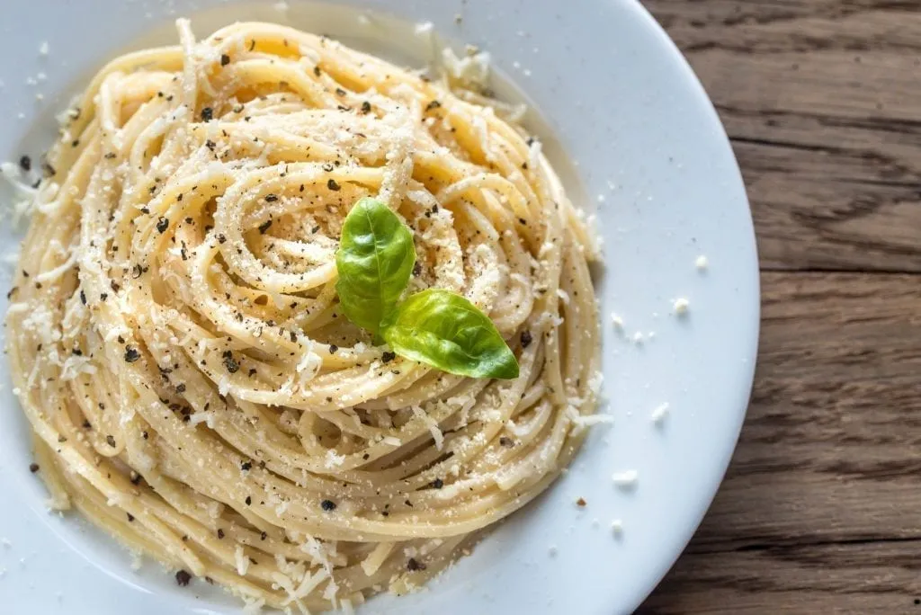 Plate of cacio e pepe shot from above, one of the best things to eat in Rome Italy