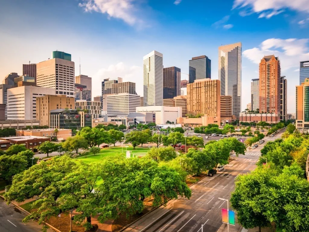 Skyline of Houston Texas as seen on a sunny day with a park in the foreground, Houston is one of the best weekend getaways in Texas