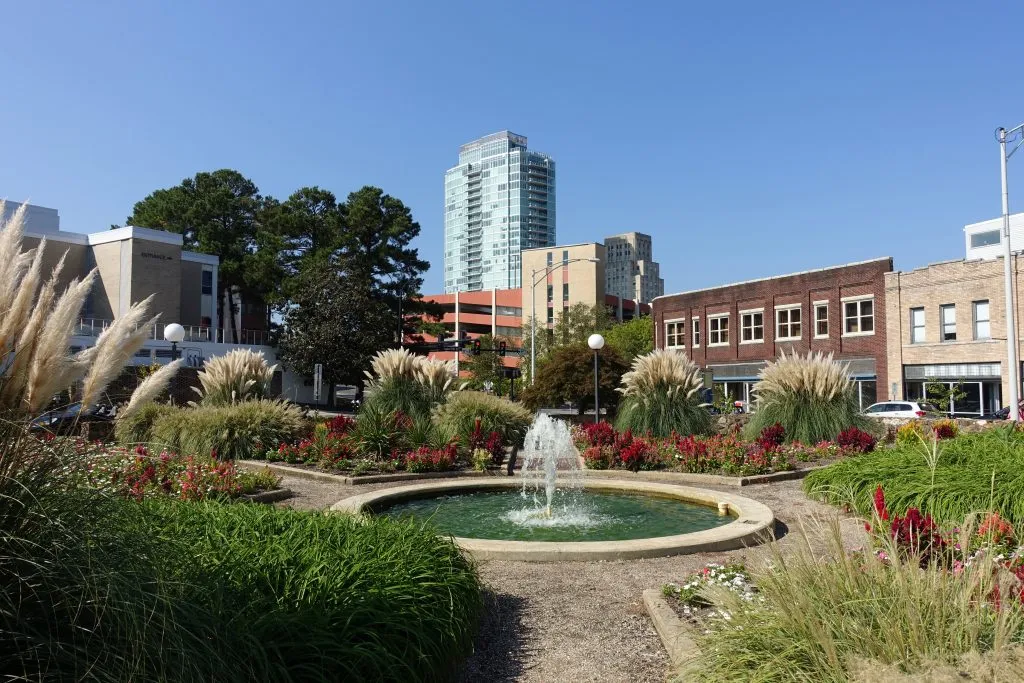 downtown park with a round fountain in durham north carolina southern city