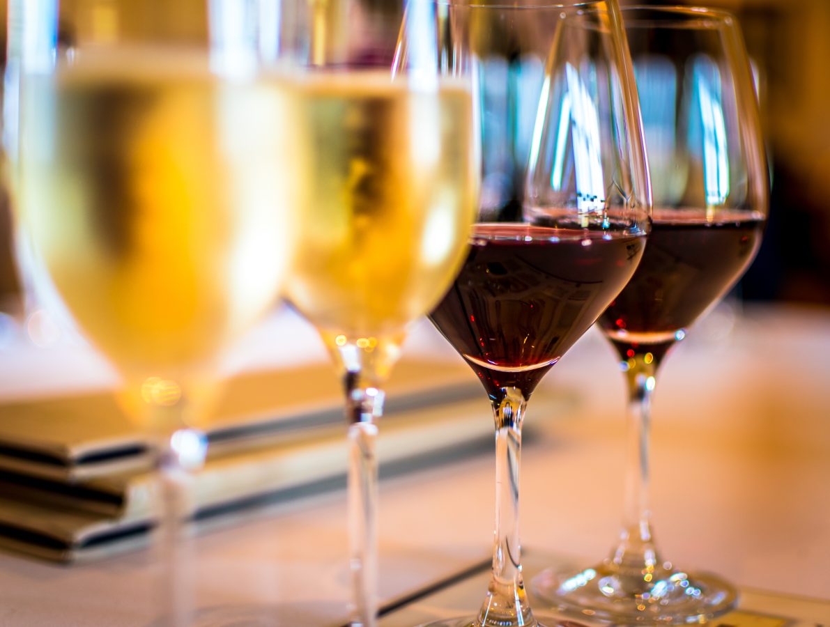 collection of 4 wine glasses at a wine tasting in northern california