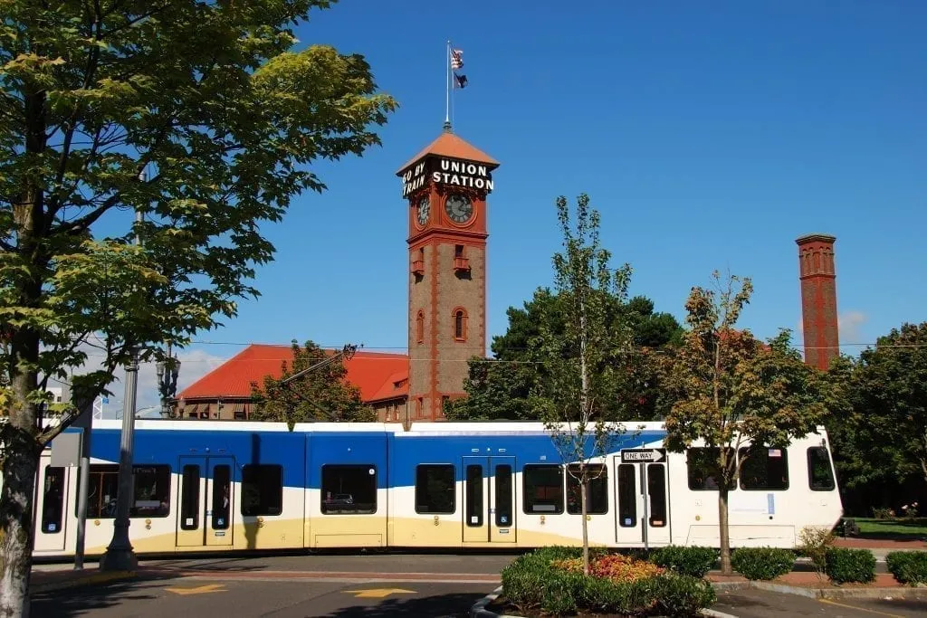 Tram in front of Union Tower in Portland Oregon, where you'll start your Portland 3 day itinerary in the Pearl district