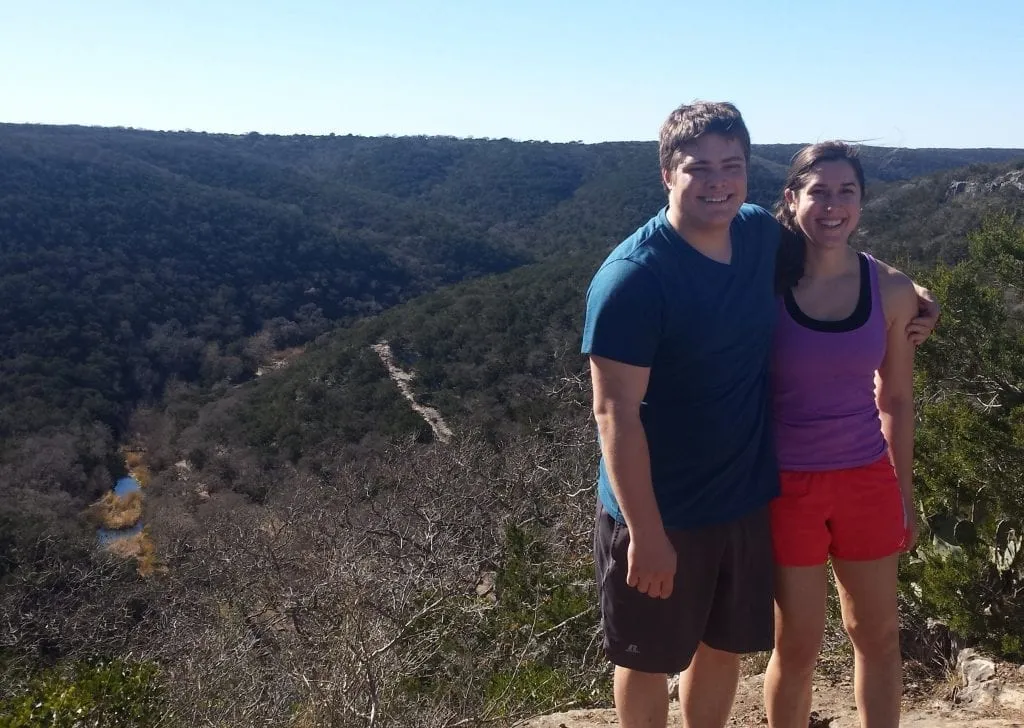 Jeremy Storm and Kate Storm hiking in Lost Maples State Park, one of the best day trips from San Antonio TX