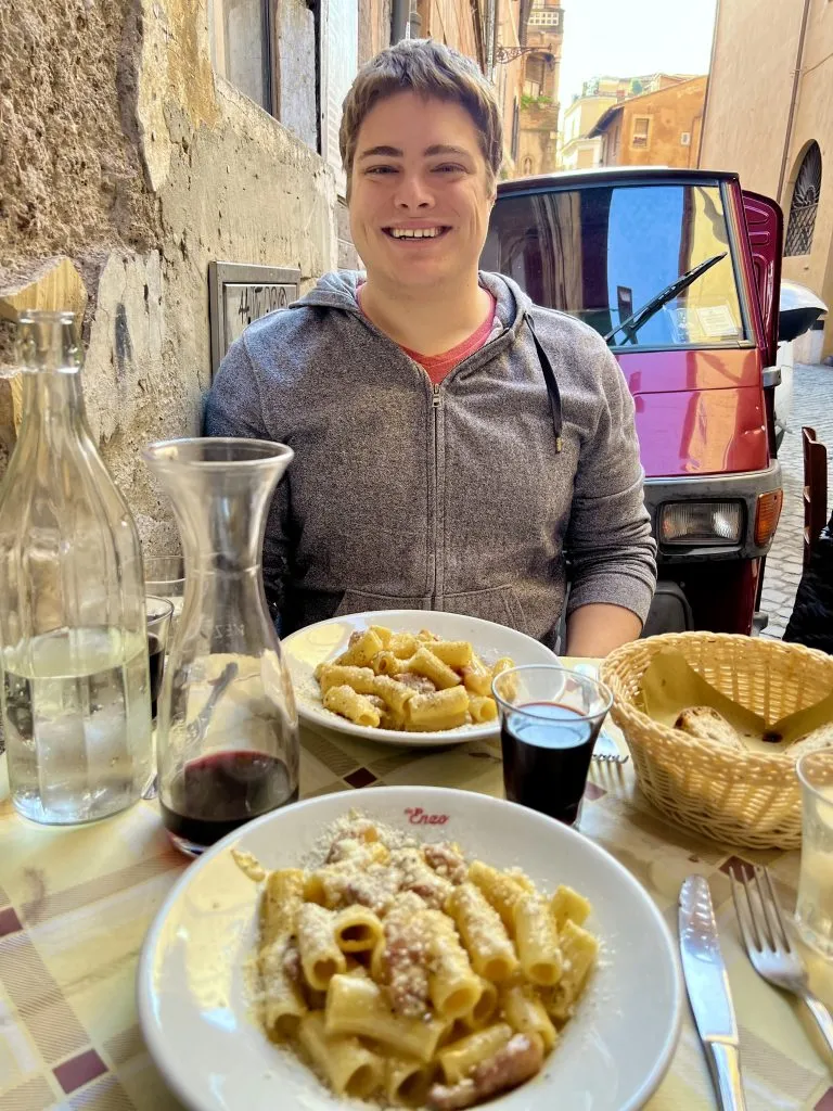 jeremy storm at trattoria da enzo al 29 in trastevere rome with carbonara on the table